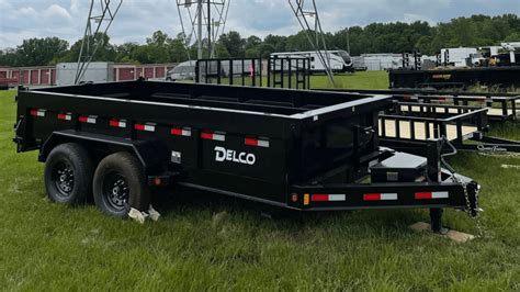 Delco trailers - 2023 Delco 14K Bumper Tilt Trailer $10,107.60 Stock # T320A1. Easy to load knife edge bed with low 24" ride height makes your job easy. 12K Spring loaded Jack. Black Diamond Plate fenders are as tough as they are good looking. Treated pine wood deck. Welded and powder coated tool box and spare tire mount are a solid choice. Adjustable 2 5/16 ...
